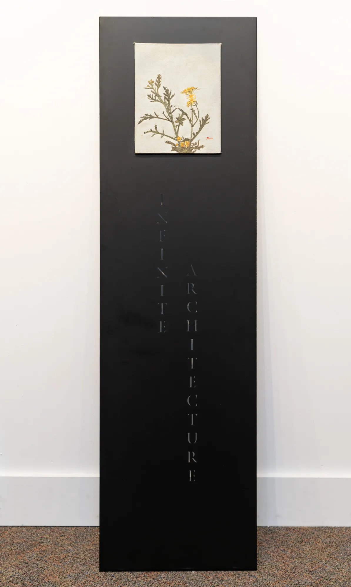 Painting of flowers against a sky attached to a tall metal plinth.