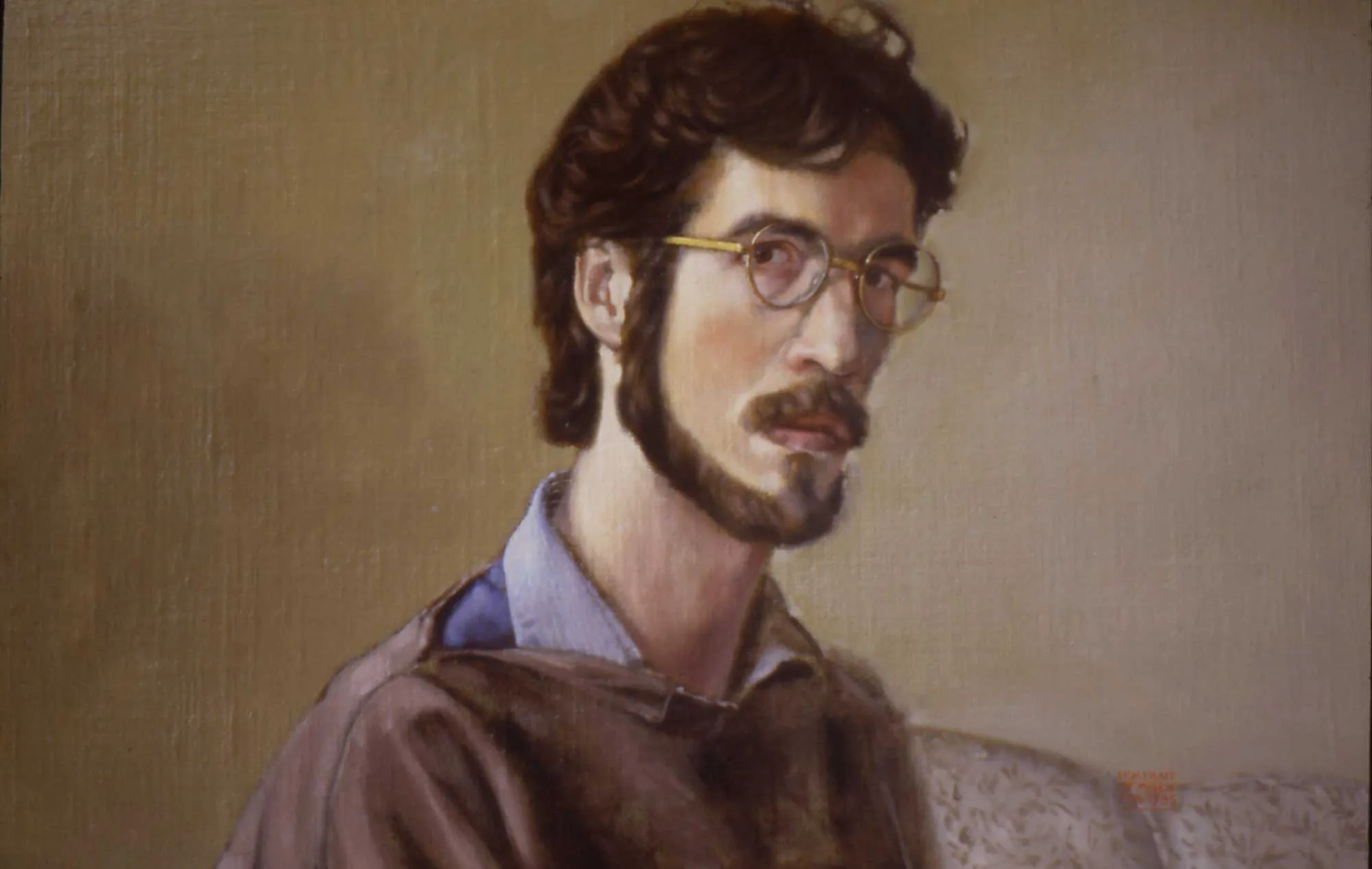 Portrait of a man looking out at the viewer.